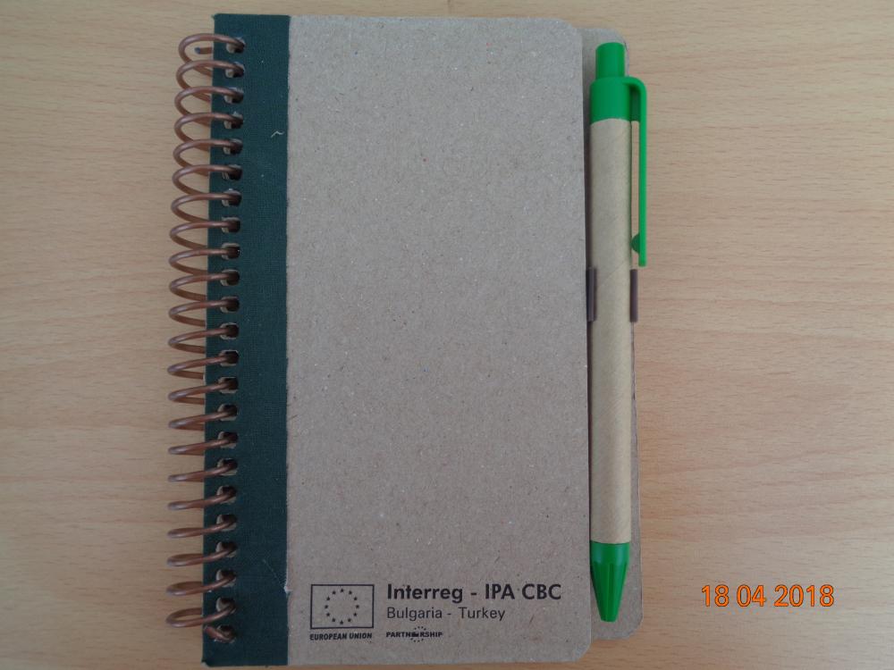 Project notepad with pens of recycled materials